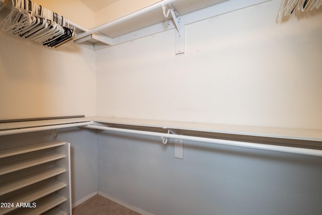 walk in closet featuring tile patterned floors