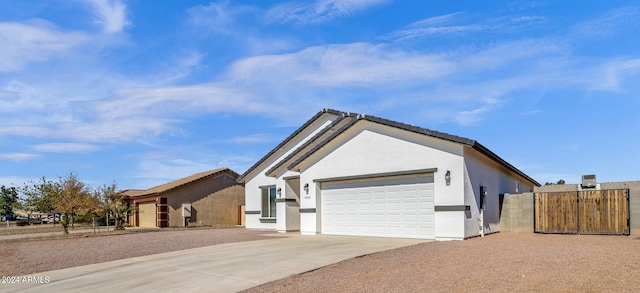 single story home with a garage