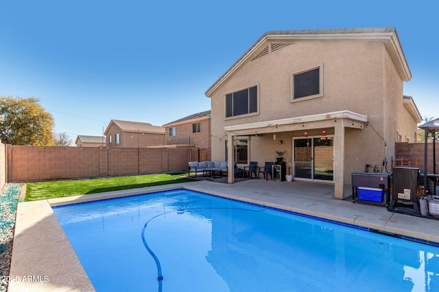 view of swimming pool featuring a patio area