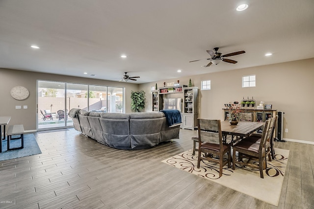 living room featuring ceiling fan