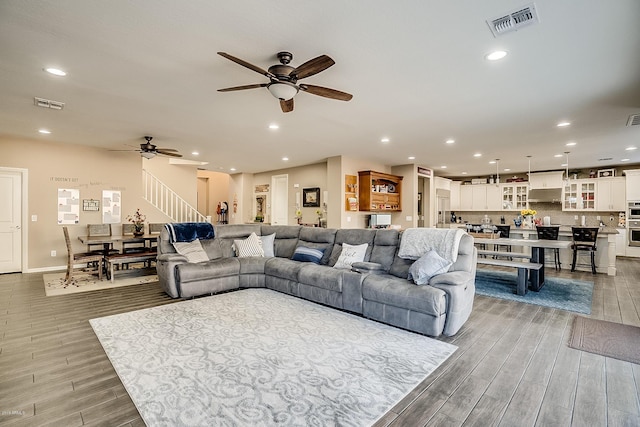 living room featuring ceiling fan