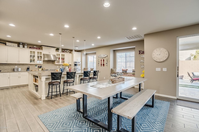 dining area featuring light hardwood / wood-style floors