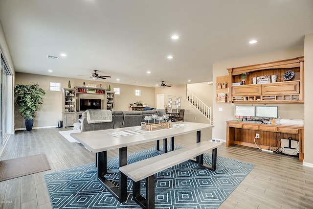 dining space with ceiling fan