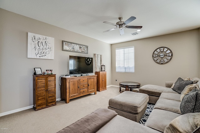 living room with ceiling fan and light carpet