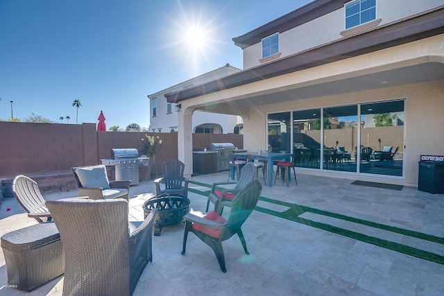 view of patio / terrace featuring area for grilling and an outdoor kitchen