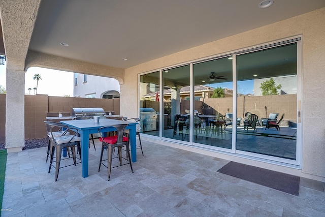 view of patio featuring a grill