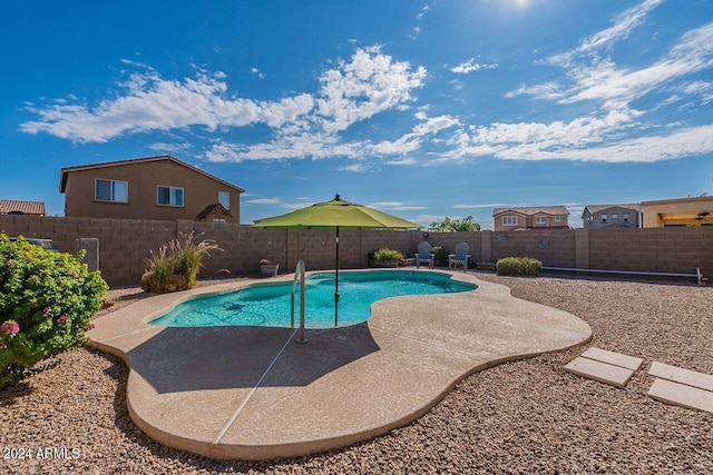 view of swimming pool featuring a patio