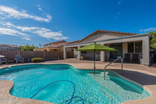 view of pool with a patio