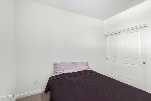 unfurnished bedroom with carpet flooring