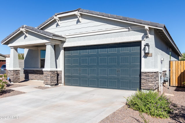 craftsman house featuring a garage