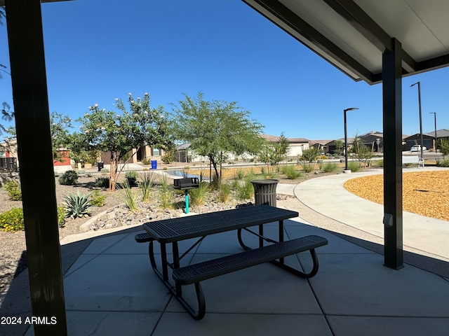 view of property's community featuring a patio