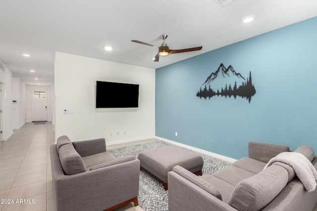 tiled living room with ceiling fan