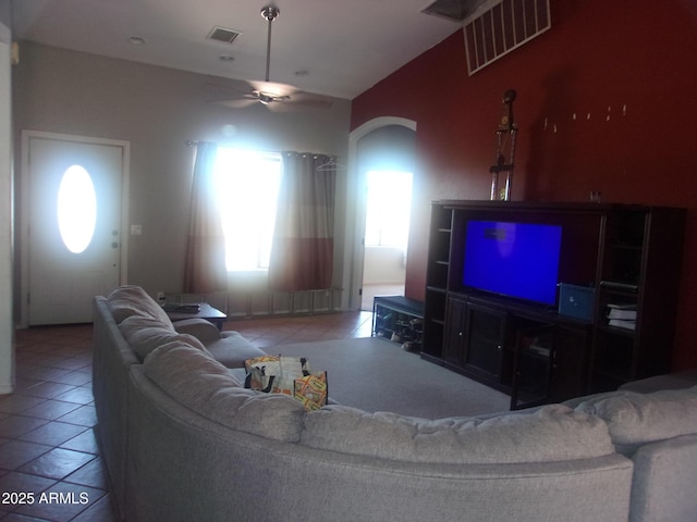 4616 E Monument Way, Rimrock, AZ 86335 - living room with a ceiling fan, tile patterned floors, and arched walkways