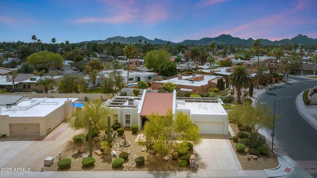 bird's eye view featuring a residential view and a mountain view