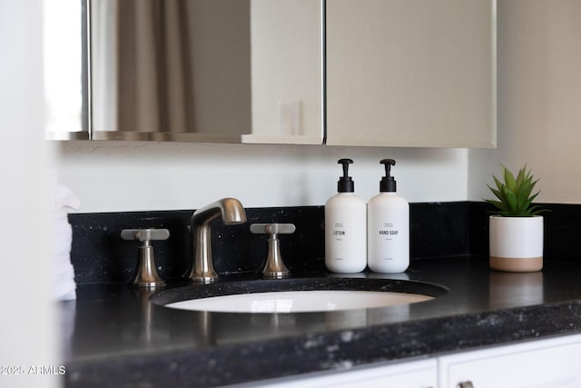 interior details with tasteful backsplash and a sink