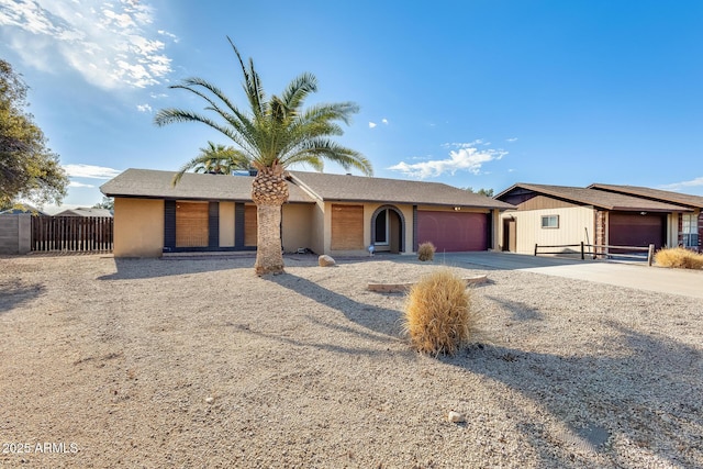 ranch-style home with a garage