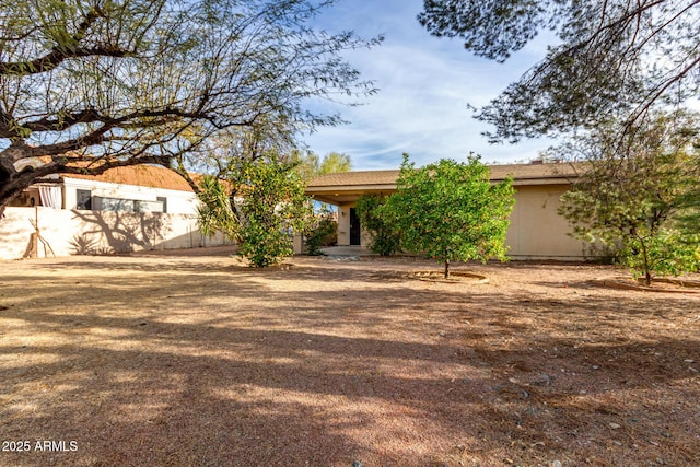 view of front of house with fence