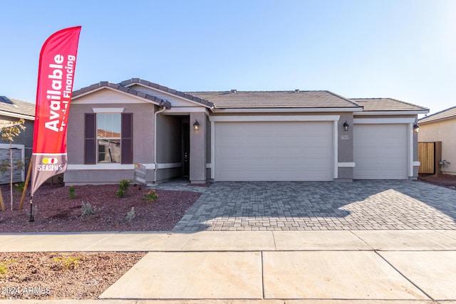 view of front of home with a garage