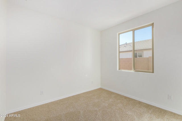 empty room featuring carpet floors