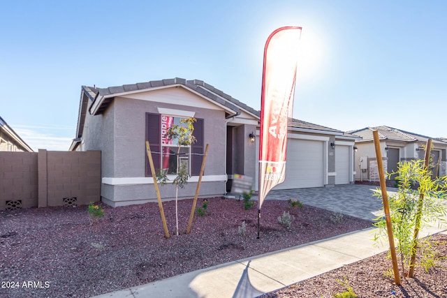 view of front of home with a garage