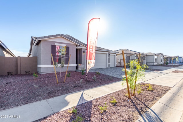 view of front of property with a garage