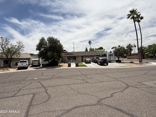 10601 N 36th St, Phoenix, AZ 85028 - view of front facade with concrete driveway and a garage