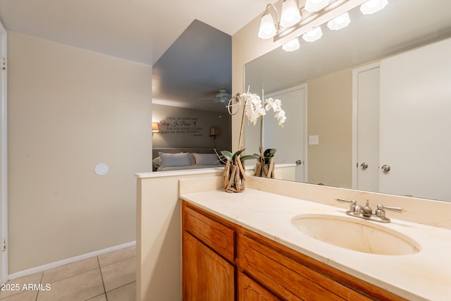 10601 N 36th St, Phoenix, AZ 85028 - bathroom with tile patterned flooring, vanity, ceiling fan, and baseboards
