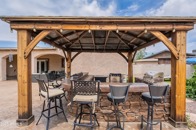 10601 N 36th St, Phoenix, AZ 85028 - view of patio / terrace featuring a gazebo and exterior bar