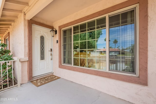 10601 N 36th St, Phoenix, AZ 85028 - property entrance with stucco siding and a porch