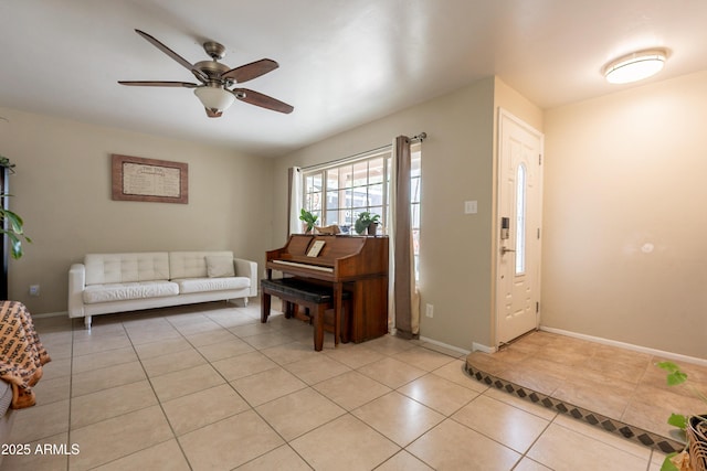 10601 N 36th St, Phoenix, AZ 85028 - entrance foyer with light tile patterned flooring, ceiling fan, and baseboards
