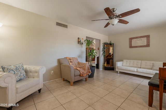 10601 N 36th St, Phoenix, AZ 85028 - living room with ceiling fan and light tile patterned flooring
