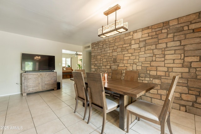 10601 N 36th St, Phoenix, AZ 85028 - dining area with light tile patterned flooring and a ceiling fan