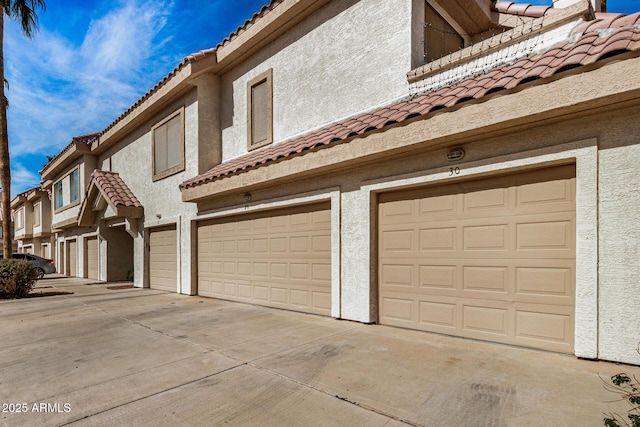 exterior space with a garage