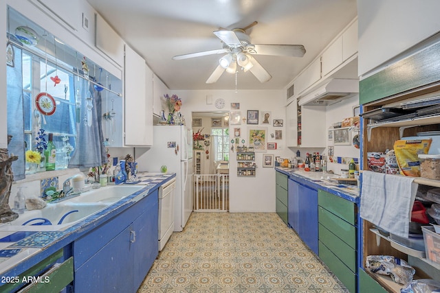3303 E Clarendon Ave, Phoenix, AZ 85018 - kitchen featuring white cabinetry, a ceiling fan, dishwasher, blue cabinetry, and black oven