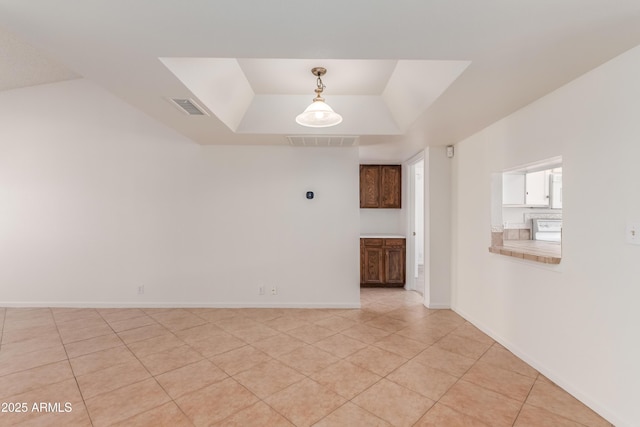 6534 S Marilyn Ann Dr, Tempe, AZ 85283 - empty room with a tray ceiling, light tile patterned flooring, baseboards, and visible vents
