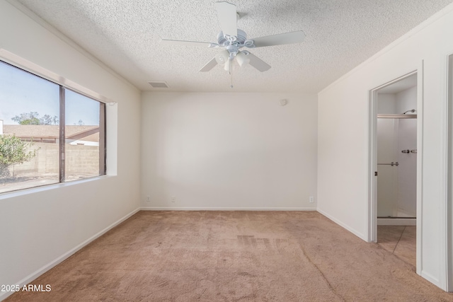 6534 S Marilyn Ann Dr, Tempe, AZ 85283 - carpeted empty room featuring baseboards, visible vents, a textured ceiling, and a ceiling fan