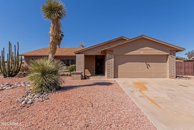6534 S Marilyn Ann Dr, Tempe, AZ 85283 - view of front of house featuring concrete driveway and a garage
