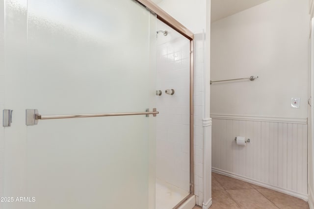 6534 S Marilyn Ann Dr, Tempe, AZ 85283 - full bath with tile patterned flooring, a wainscoted wall, and a shower stall