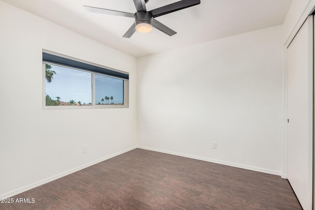 15440 S 38th St, Phoenix, AZ 85044 - unfurnished room with dark wood finished floors, baseboards, and a ceiling fan