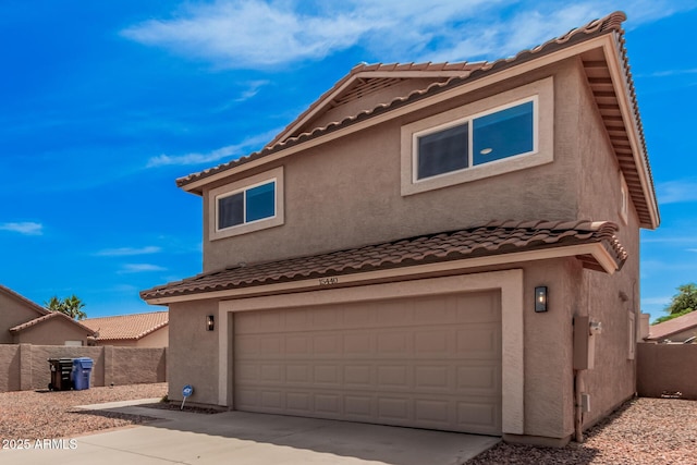 15440 S 38th St, Phoenix, AZ 85044 - view of front facade featuring a tile roof, a garage, stucco siding, and driveway