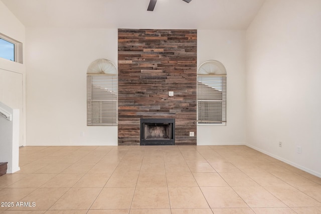 15440 S 38th St, Phoenix, AZ 85044 - unfurnished living room with ceiling fan, a tiled fireplace, and tile patterned floors