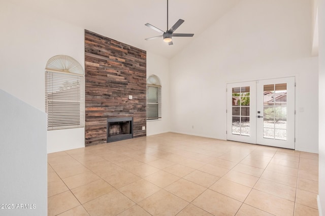 15440 S 38th St, Phoenix, AZ 85044 - unfurnished living room featuring high vaulted ceiling, ceiling fan, light tile patterned floors, a tiled fireplace, and french doors