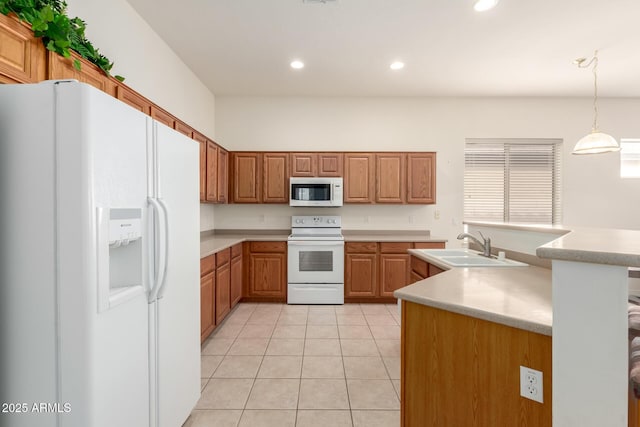 kitchen with white appliances, light tile patterned flooring, recessed lighting, a sink, and light countertops