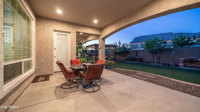view of patio featuring outdoor dining area and a fenced backyard