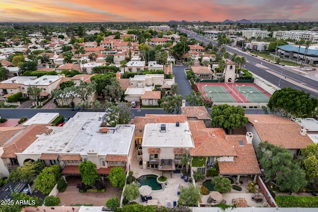 aerial perspective of suburban area with a pool area