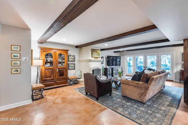 living room with baseboards, beam ceiling, a fireplace, and recessed lighting