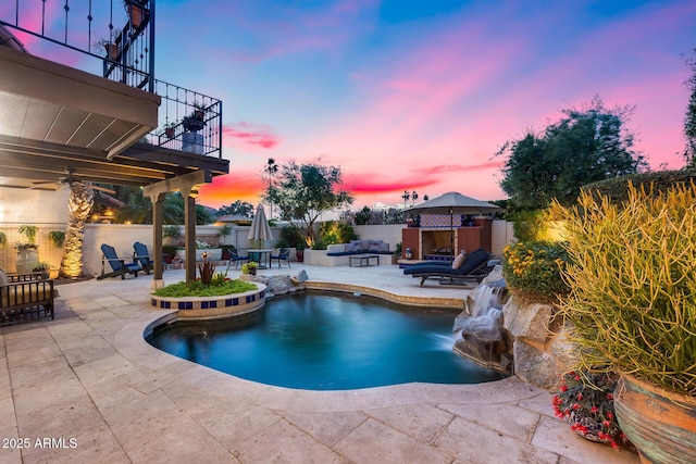 view of swimming pool with a patio and fence