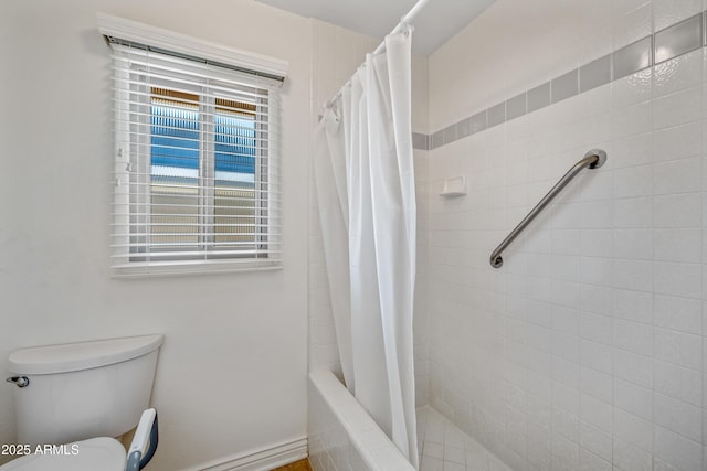 bathroom featuring toilet