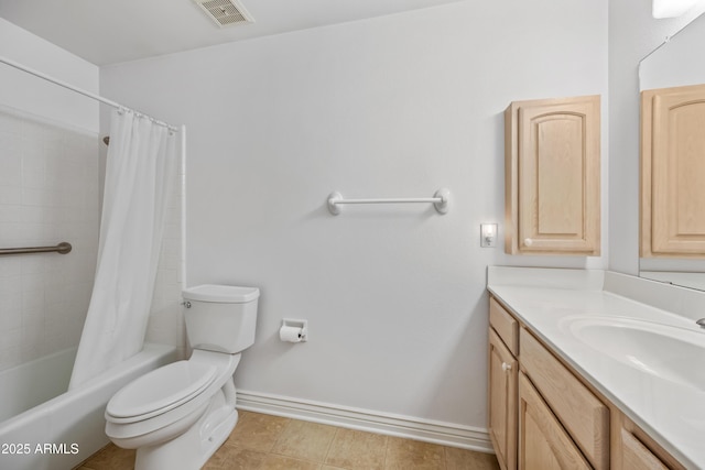bathroom featuring toilet, vanity, baseboards, and shower / bath combo with shower curtain