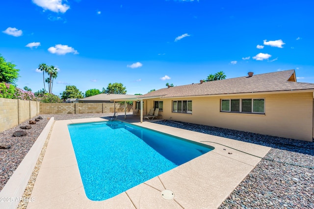 view of pool with a patio area and a fenced backyard